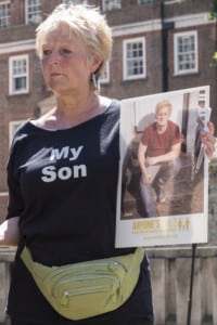 Chris in my son t-shirt outside parliament